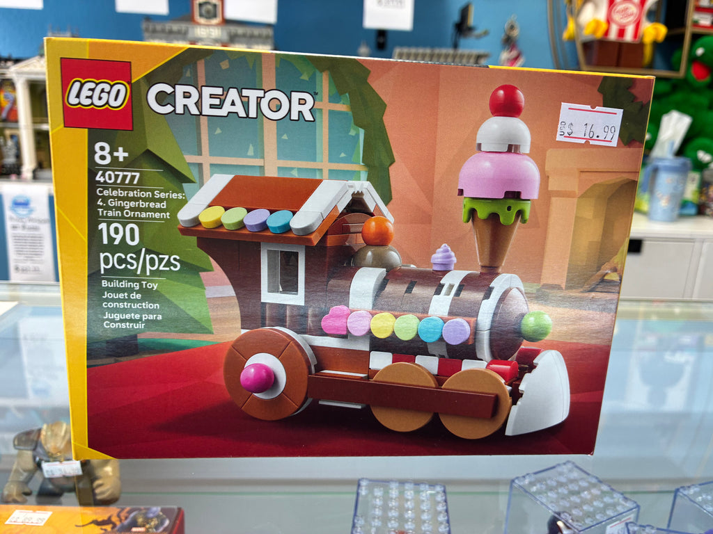 40777 Celebration Series: 4. Gingerbread Train Ornament - Sealed